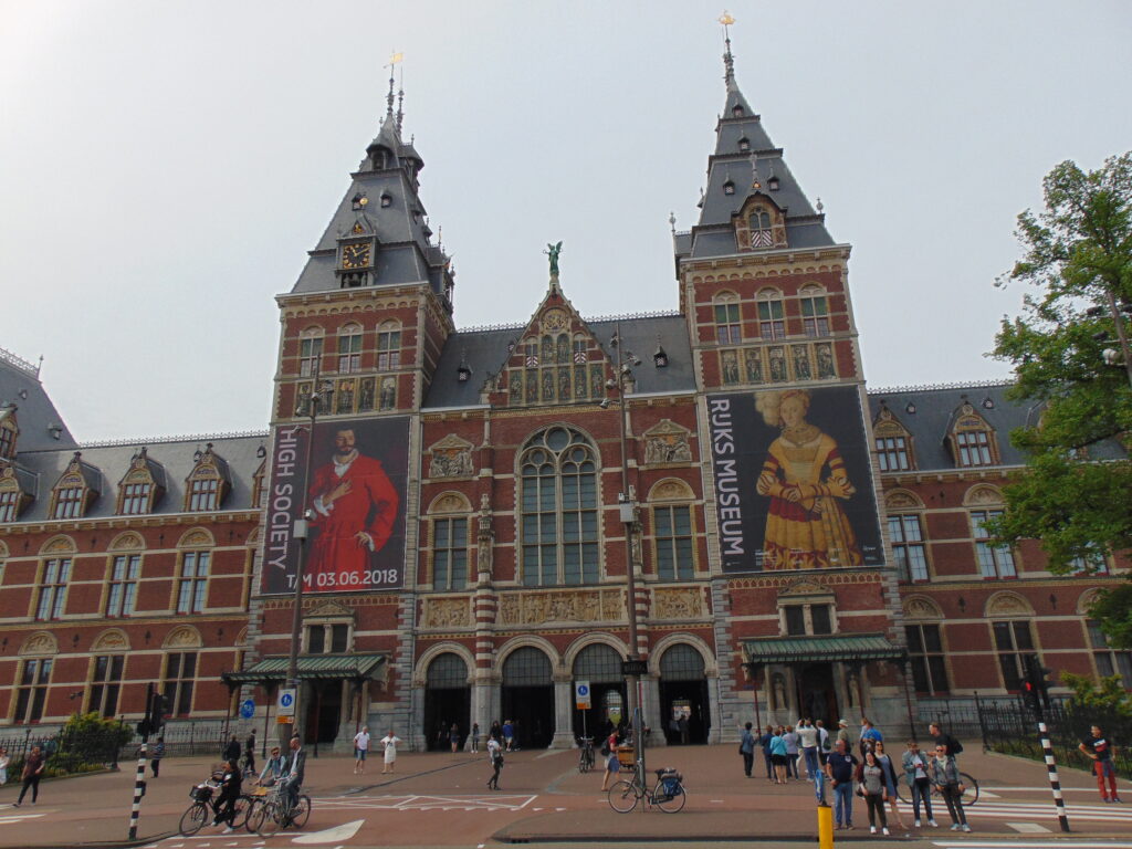 This is a picture of the Rijksmuseum clock tower in Amsterdam, that is similar in design to the Amsterdam Central Station.