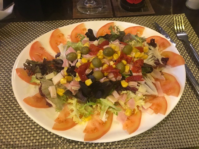 Picture of a salad from Caminito Pizza Bar.