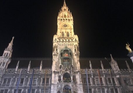 This is a picture taken at night of the Rathaus Glockenspiel in Munich, Germany.
