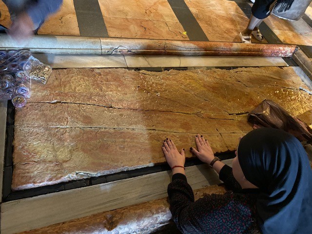 Picture of the Stone of Atoning inside the Church of the Holy Sepulcher.